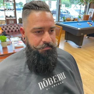 Instagram post from top_quality_barber. This post is in position 2.