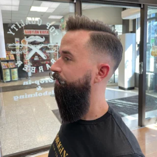 Instagram post from top_quality_barber. This post is in position 10.